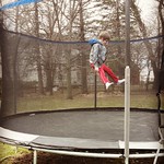 Happiness is...daddy finally put up the trampoline! 