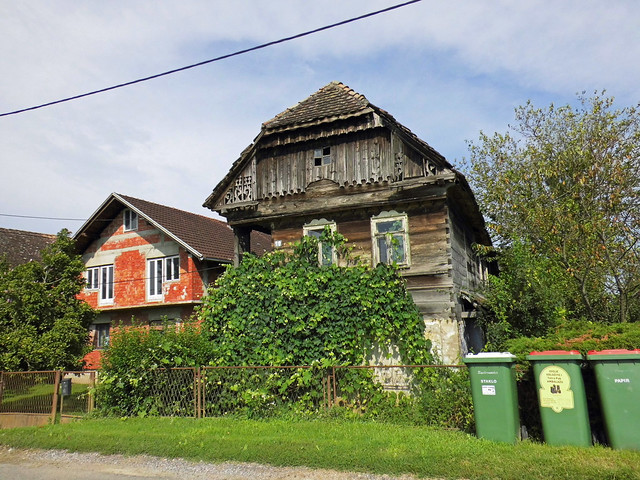 Old wooden houses in the Lonja Polje