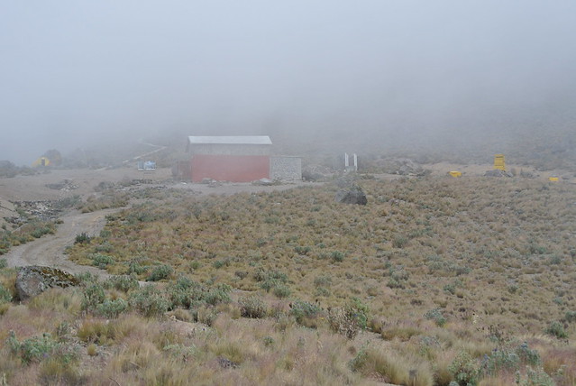 Cloud covered Piedra Grande Hut at 4,270 m (14,010 ft)