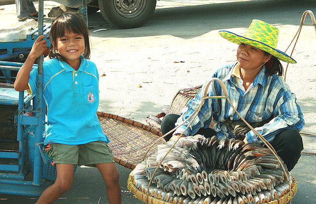 one-sun fish vendor with daughter