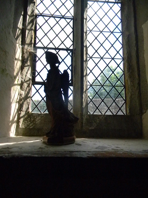 Angel in the window Alciston Church. Lewes to Berwick