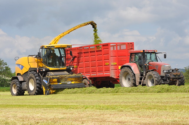 New Holland FR9080 Forage Harvester filling a Dooley Silage Trailer drawn by a Case IH CVX 1170 Tractor