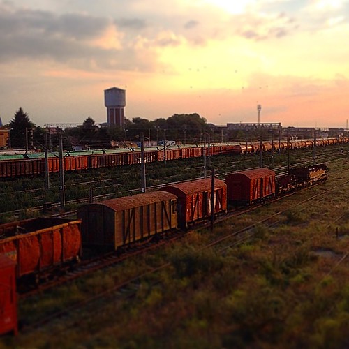 Sunset #train #trainyard #tracks #instaphoto #instalove #landscape #landscape_lovers #instagood #sunset #light #dimlight #countryside #peaceful by Muahdib, sunset square landscape hometown trains squareformat trainyard tracka iphoneography instagramapp