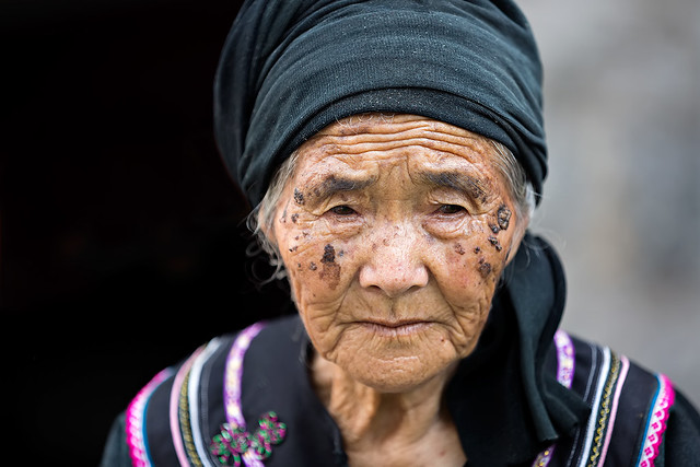 Portrait of a tribal woman in Xinjie, Yunnan, China.