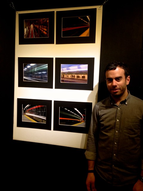 Adam Saul exhibiting his subway photos