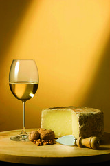 White winer glass and cheese