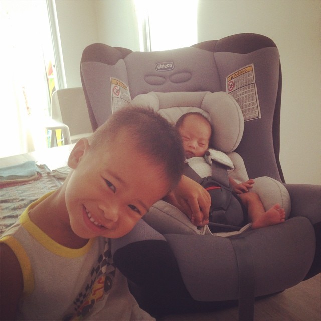 time to visit their pedia. Milo passing her car seat now to Isla. #syticsays #miloeveryday #islafighter