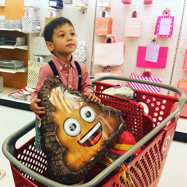 Poop emoji has been chosen by #Toddlerboy Jasper for his piñata...... what exactly should go into a poop emoji piñata?