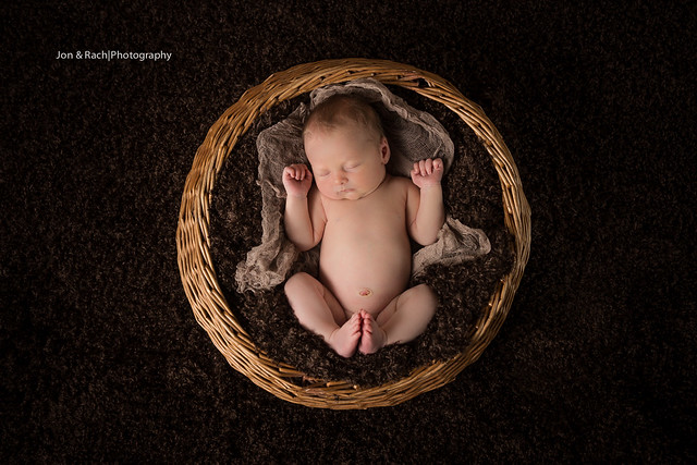 Newborn in a basket