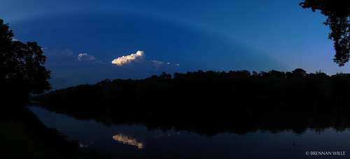 blue trees light sunset shadow summer sky panorama sun storm reflection nature water silhouette june clouds river evening spring ray pennsylvania pa ripples crepuscularrays severe thunderhead camphill 2014 hugin conodoguinetcreek canonpowershotg12 brennanwille