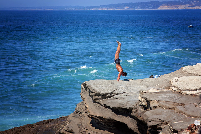beach cliffs handstand