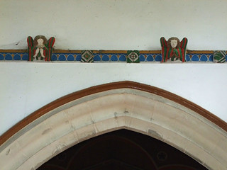 painted angels above the chancel arch