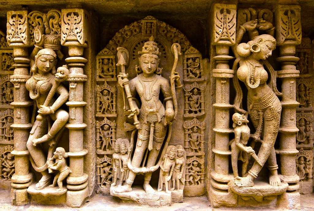 Voluptuous Apsaras and the male deity, Parshuram
