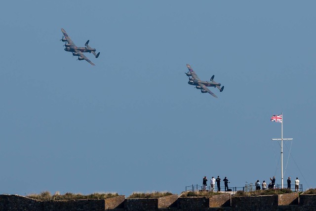 Battle of Britain Memorial Flight Avro Lancaster Thumper displaying with the Canadian Lancaster Vera over castle Cornet