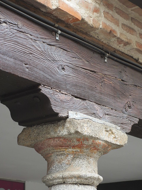 Wood atop stone, arcade detail in Alcalá de Henares, Spain