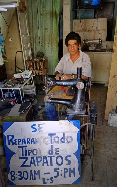 a shoe repair service out of a home in Regla
