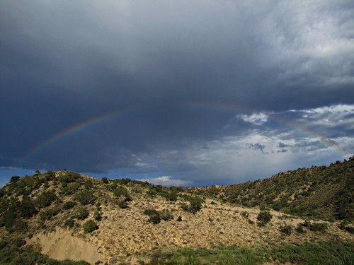 Vernal Mesa rainbow by jimsawthat, On the road to Black Canyon of the Gunnison National Park, Montrose CO.mountains clouds rural rainbo