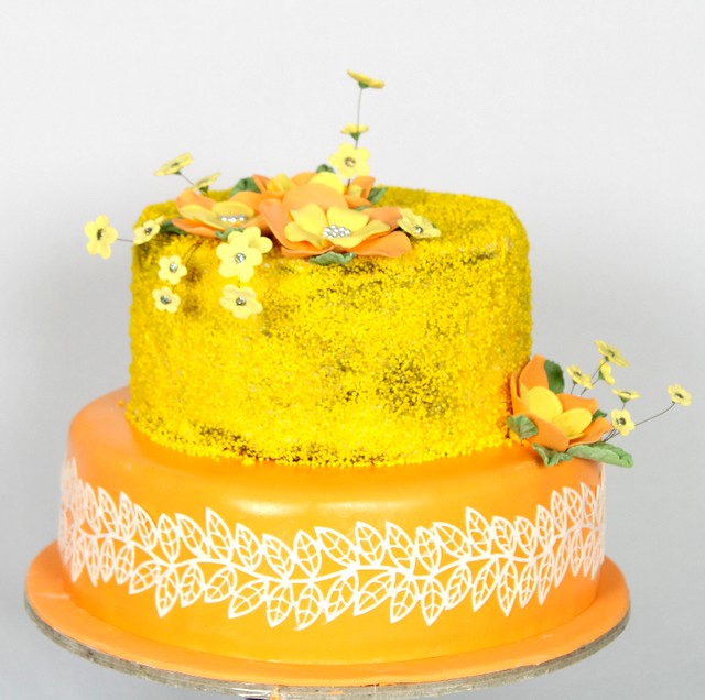 Yellow 2 tier Lace and floral decorated cake