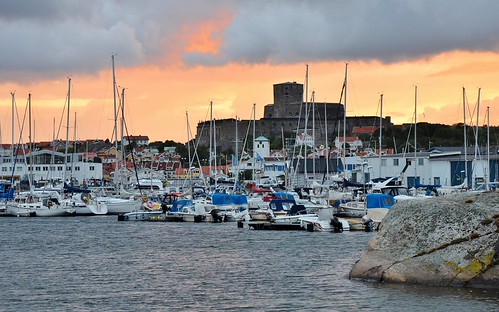 Sunset on Marstrand by Perfect Gnat, Kungälv - Västra Götaland, Swedencity sunset sea sky orange cloud castle island boat cloudy sweden v
