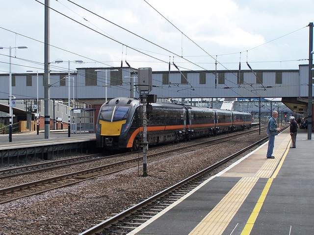 Grand Central 180114 races through Peterborough with the 1A63 1021 Bradford Interchange to London Kings Cross service 13-09-14