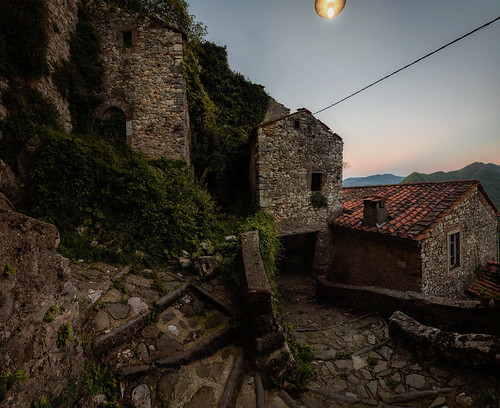 lucchio 13 by Dario Morelli, The rock, the stone of the medieval village and that of the fortress fused together generate a dark