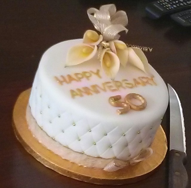 Arum lily cake topper.  Golden wedding anniversary cake.