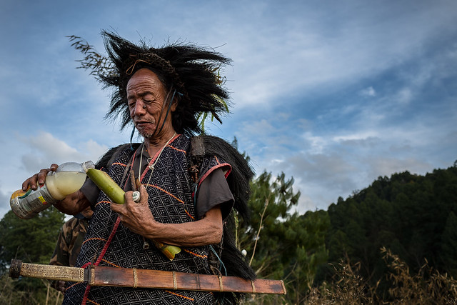 Apatani old shaman with his sword during a traditional ceremony