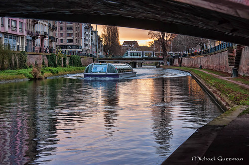 canal riverboat waterway sunset bridge tram strasbourg france travel tour canaldesfauxremparts city