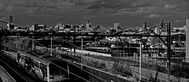 manchester skyline and train mono