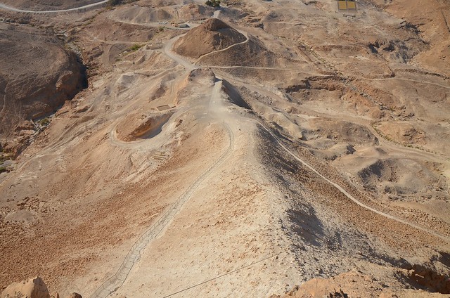 View from the hilltop of Masada of the Roman siege ramp and remnants of Camp E, one of several legionary camps, Masada