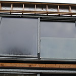 Lift & slide doors with aluminium & glass balcony