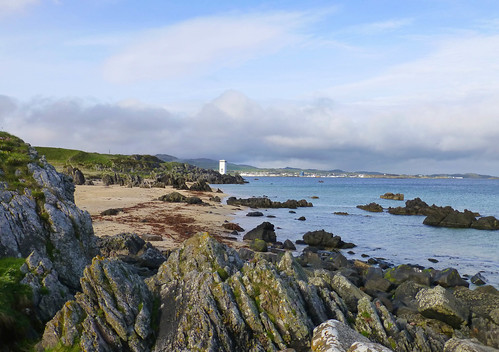 sea lighthouse beach island scotland rocks portellen singingsands isleofislay argyllandbute worldtrekker