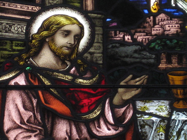 Detail of Jesus in the Harriet Mary Ellis Memorial Stained Glass Window of Jesus in the House of Martha and Mary; St Jude's Church of England - Corner of Lygon, Palmerston and Keppel Streets, Carlton