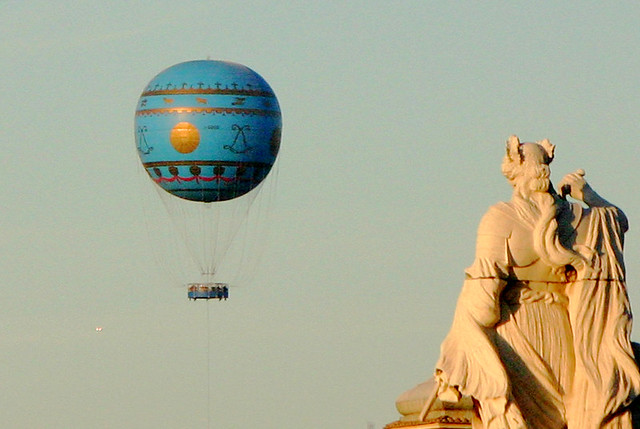 The saint blesses the balloon above Rome