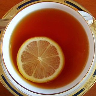 Tea contains colors that become lighter in acidic solutions.