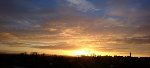 dawn daybreak sunrise sky sun silhouettes trees church spire swindon wilts wiltshire uk january 2017 stevemaskell