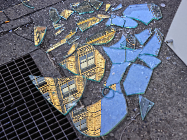 Broken Glass on Broadway with Reflection