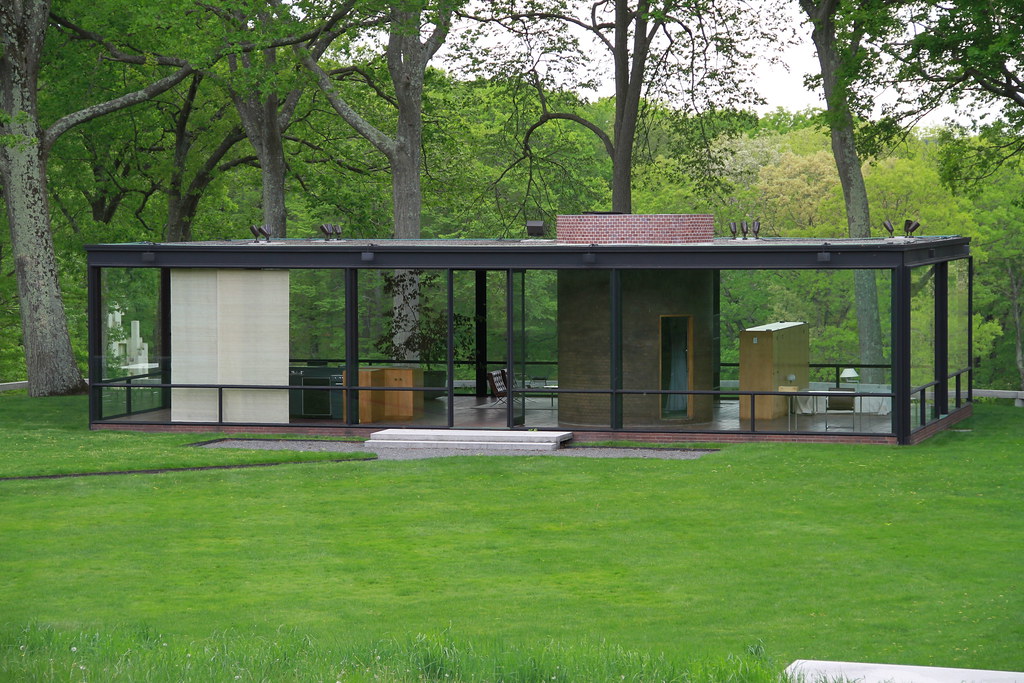 Philip Johnson’s Glass House - New Canaan, Connecticut: A glass building without traditional walls, but there are still structural posts throughout the structure, likely made of steel. 