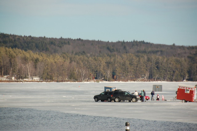 Ice fishermen's trucks parked on Lake Winnipesaukee