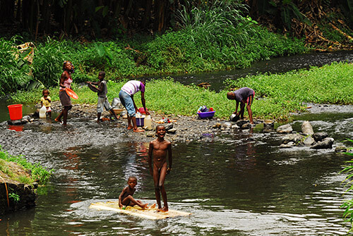 Sao Tome, Micolo, african children playing on raft on 