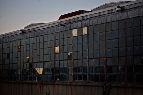 reflections by vistavision, Non-frosted windowpanes reflecting the sunset. Abandoned shoe factory, Paducah, Kentucky.building ab