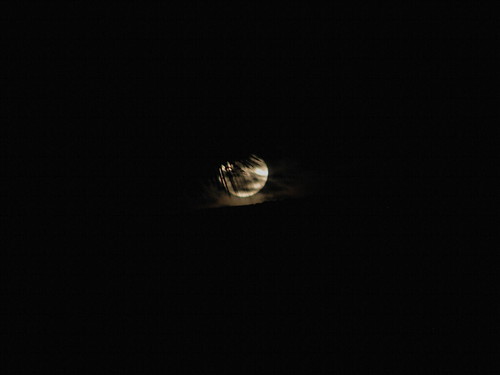 Hiding Behind the Moon.. by Manoj Kengudelu