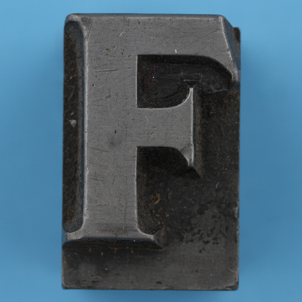 metal type letter F