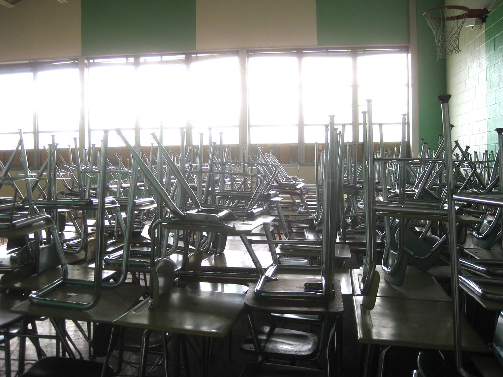 gymnasium full of desks