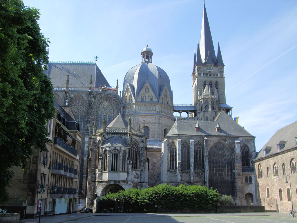 Aachen Cathedral And Palatine Chapel - Germany: A large ornate castle-like structure. 