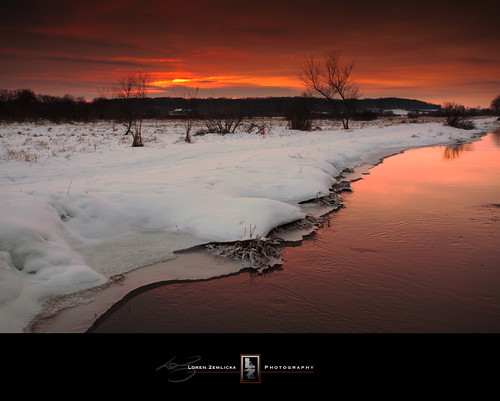 winter sunset sky orange snow ice nature water wisconsin river landscape photography photo midwest stream december image picture bank newyear explore madison ripples 2009 canonef1740mmf4lusm canoneos5d flickrexplore flickrfrontpage ninesprings lorenzemlicka