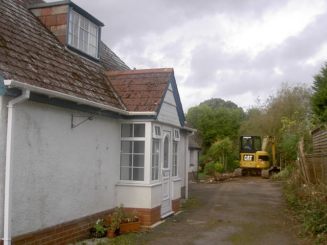 <p>Demolish garage and build new garage with bedroom above. Take down existing first floor and rebuild first floor and roof. Extensive alterations have transformed this 1930s bungalow into a contemporary house.</p>