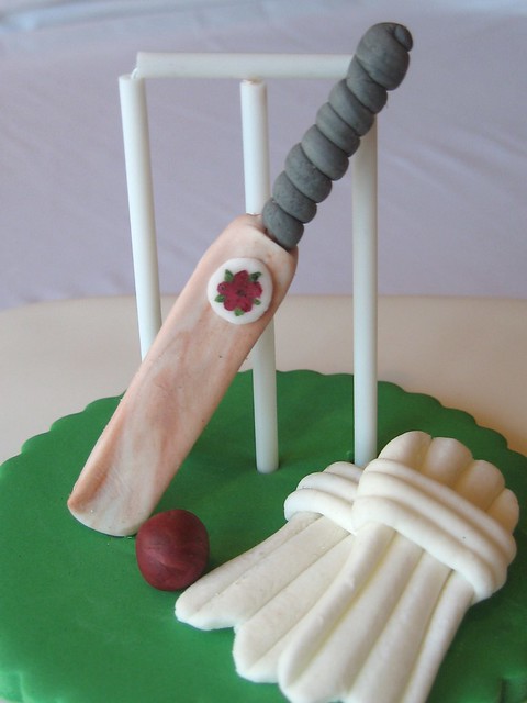 Cricket cake topper