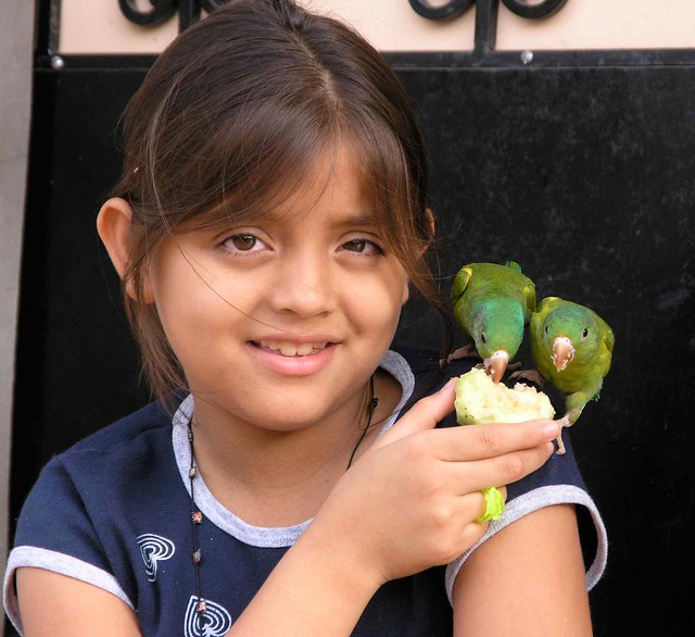 Girl with parakeets - Muchacha con pericos; Sensuntepeque, Cabañas, El Salvador