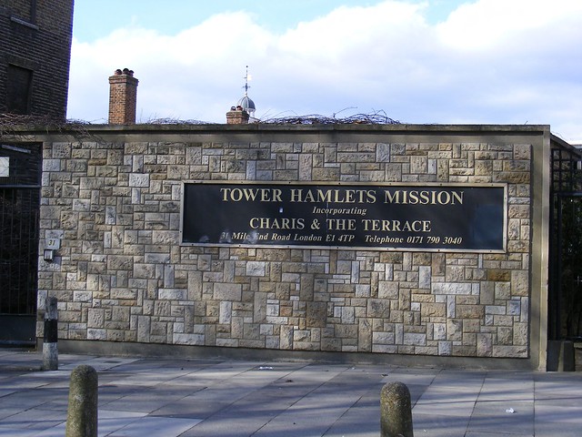 Tower Hamlets Mission  - stone clad wall, London E1